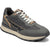 A low-top athletic sneaker in dark gray and black with beige accents, featuring white laces and a beige midsole, shown from a three-quarters angle on a white background.
