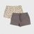 Two pairs of women's drawstring shorts laid flat on a light gray background. The front pair is solid taupe-brown, and the back pair is cream with a brown leopard print.