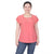 A woman modeling a coral pink short-sleeve blouse with a gathered round neckline and small decorative details, paired with blue jeans, against a plain white background.