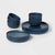 Set of blue ceramic dishes including bowls and plates on a white background