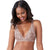 A woman wearing a beige lace-trimmed bralette against a plain white background.
