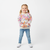 Girl wearing light grey floral sweatshirt