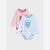 Two Marvel baby long-sleeve bodysuits with stripes, shown on a light gray background. The front bodysuit is light blue and white striped with a Captain America graphic, and the back bodysuit is red and white striped with a Spider-Man graphic.