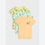 Three children's short-sleeve t-shirts stacked in a fan arrangement on a light gray background. The front shirt is peach-orange with a small graphic on the chest, the middle shirt is mint green with a palm tree print, and the back shirt is pale yellow with a cartoon animal print.
