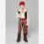 A child modeling a pirate costume against a neutral gray studio background. The costume includes a cream long-sleeve shirt with brown trim, brown vest, brown-and-cream striped pants, a red headband, a red waist sash, and brown leg coverings.