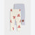 Two pairs of children's leggings laid flat on a light gray background. The front pair is cream with a red bow pattern, and the back pair is light heather gray with a small brown bear graphic.