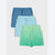 Three pairs of children's drawstring shorts in blue, light blue, and green gradient colors, arranged in a stacked diagonal layout on a light gray background.