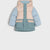A hooded puffer jacket with a color-blocked design, featuring light blue sleeves and lower body, a dusty pink upper chest and hood, and a muted teal center panel and front pockets, shown against a light gray background.