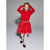 A young girl modeling a festive red holiday outfit consisting of a long-sleeve cowl-neck knit top and a sparkly tulle tutu skirt with a gold glittery waistband, paired with white tights and black shoes, against a neutral gray studio background.