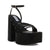 Black platform sandal with criss-cross straps on a white background