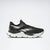 Black and white running shoe on a light gray background