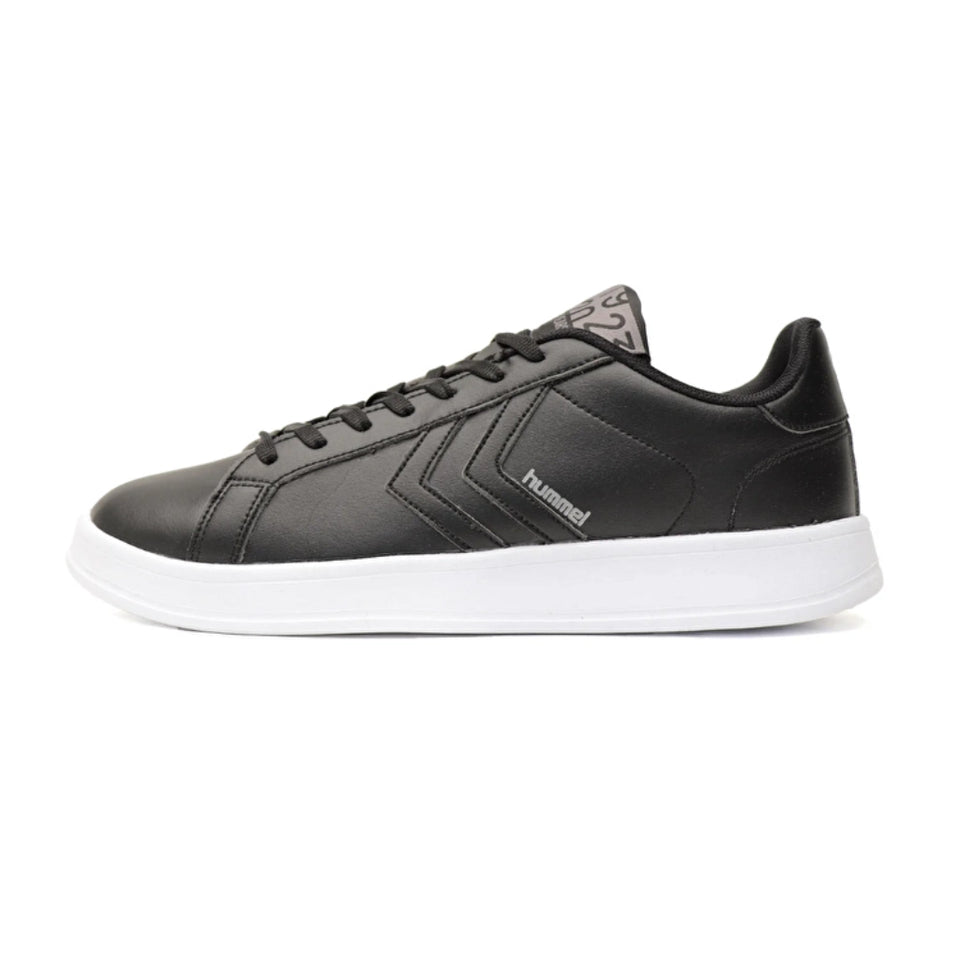A low-top sneaker in dark navy blue suede with a thick white rubber sole, featuring a small colorful logo and the brand name 'MEXICANO' on the side.
