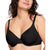 A close-up of a woman wearing a black seamless wireless bra with thin adjustable shoulder straps and a subtle underband cutout, shown against a plain white background.