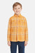 Child wearing a yellow plaid shirt on a white background