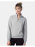 Woman wearing a gray quarter-zip sweatshirt on a white background