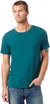 Man wearing a teal t-shirt and jeans on a white background