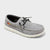 Gray casual shoe with black laces on a white background