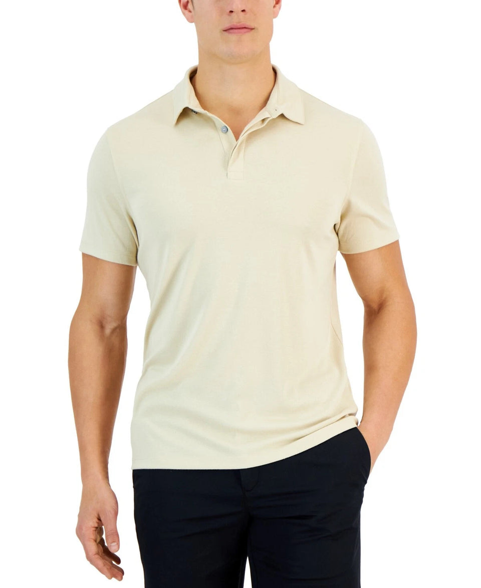 Man wearing a beige short-sleeve polo shirt on a white background