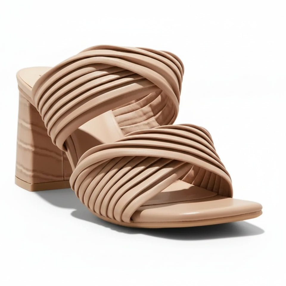 Beige heeled sandal on a light gray background