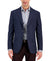 Man wearing a blue checkered suit jacket over a striped shirt on a white background