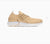 Beige sneaker with white sole on a white background