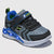 Gray and black children's sneaker with LED lights on a light gray background