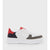 A low-top platform sneaker in white, red, navy, and dark gray, shown from a side profile view against a light gray background.
