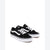 A pair of black and white Vans platform sneakers on a clean white background.