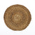A round woven natural fiber placemat or tray with a spiral pattern, shown from a top-down view on a solid white background.