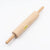 A light natural wood rolling pin with a small yellow barcode sticker on the side, photographed on a clean white background.
