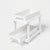A white two-tier plastic organizer with two rectangular bins, one on each level, shown on a clean white background.