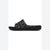 A single black slide sandal with a geometric, faceted textured upper and sole, shown in profile against a white background.