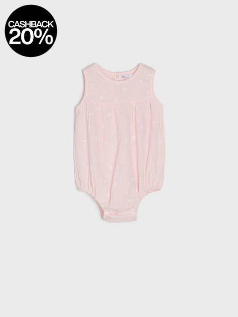 Pink baby bodysuit on a white background