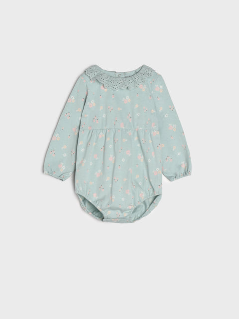 Light blue baby romper with floral pattern on a white background