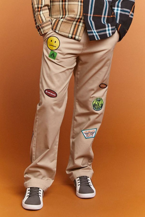 Forever 21 Men's Beige Air Walk Denim Stickers Accented Pant| Forever 21 In Lebanon