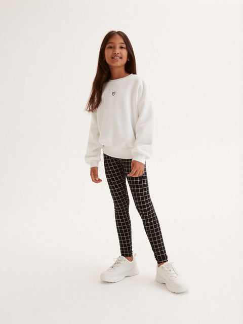 Reserved Girl's Black & White Checkered Leggings | Reserved In Lebanon