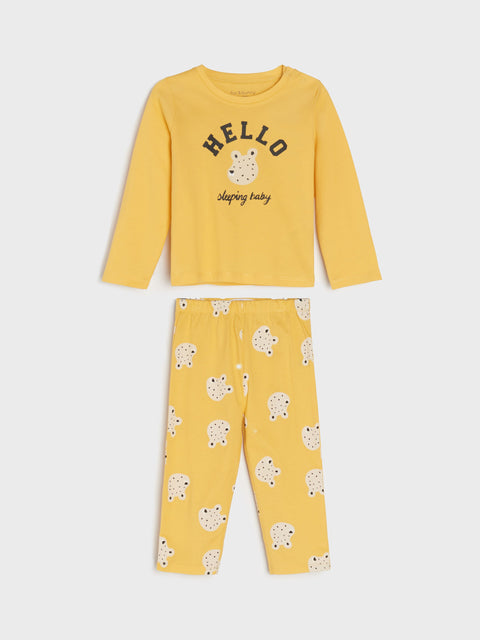 Yellow pajama set with 'Hello' and bear print on a white background
