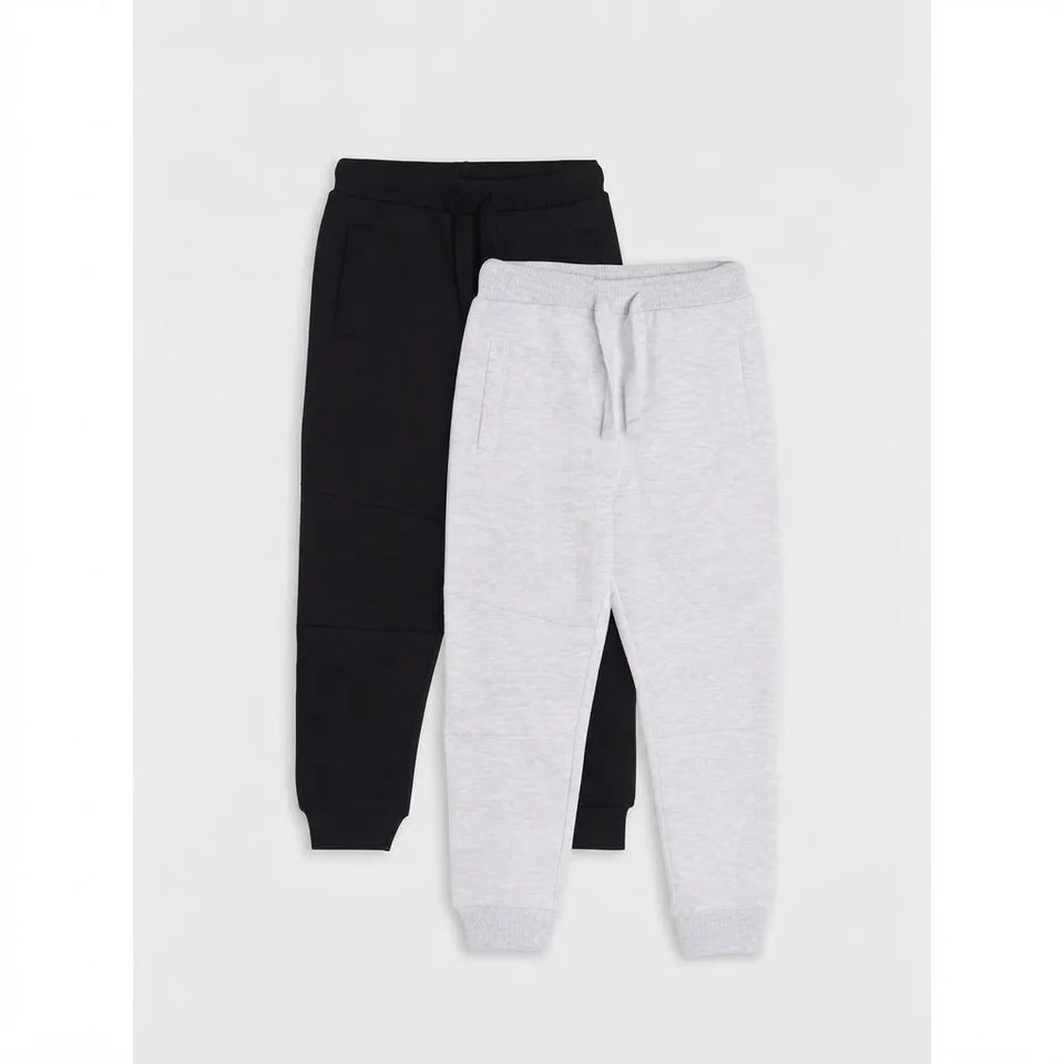 Two pairs of kids' jogger sweatpants, one in black and one in light heather gray, displayed flat against a light gray background.