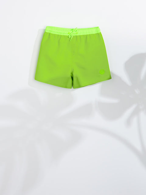 Green shorts on a white background