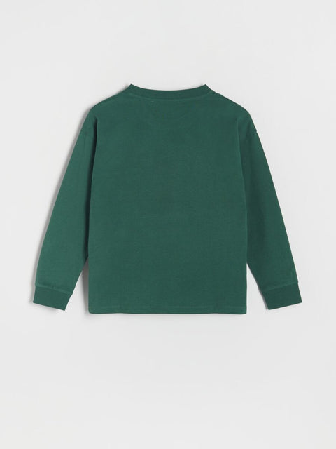 Green long-sleeve shirt on a light gray background