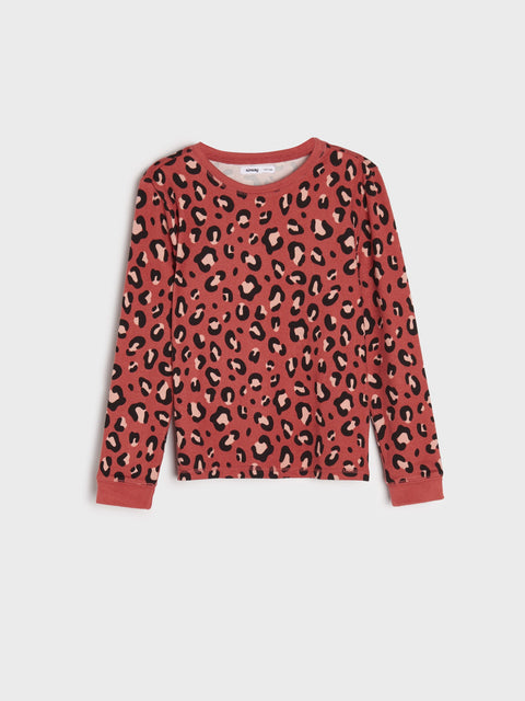 Red long-sleeve shirt with leopard print on a white background