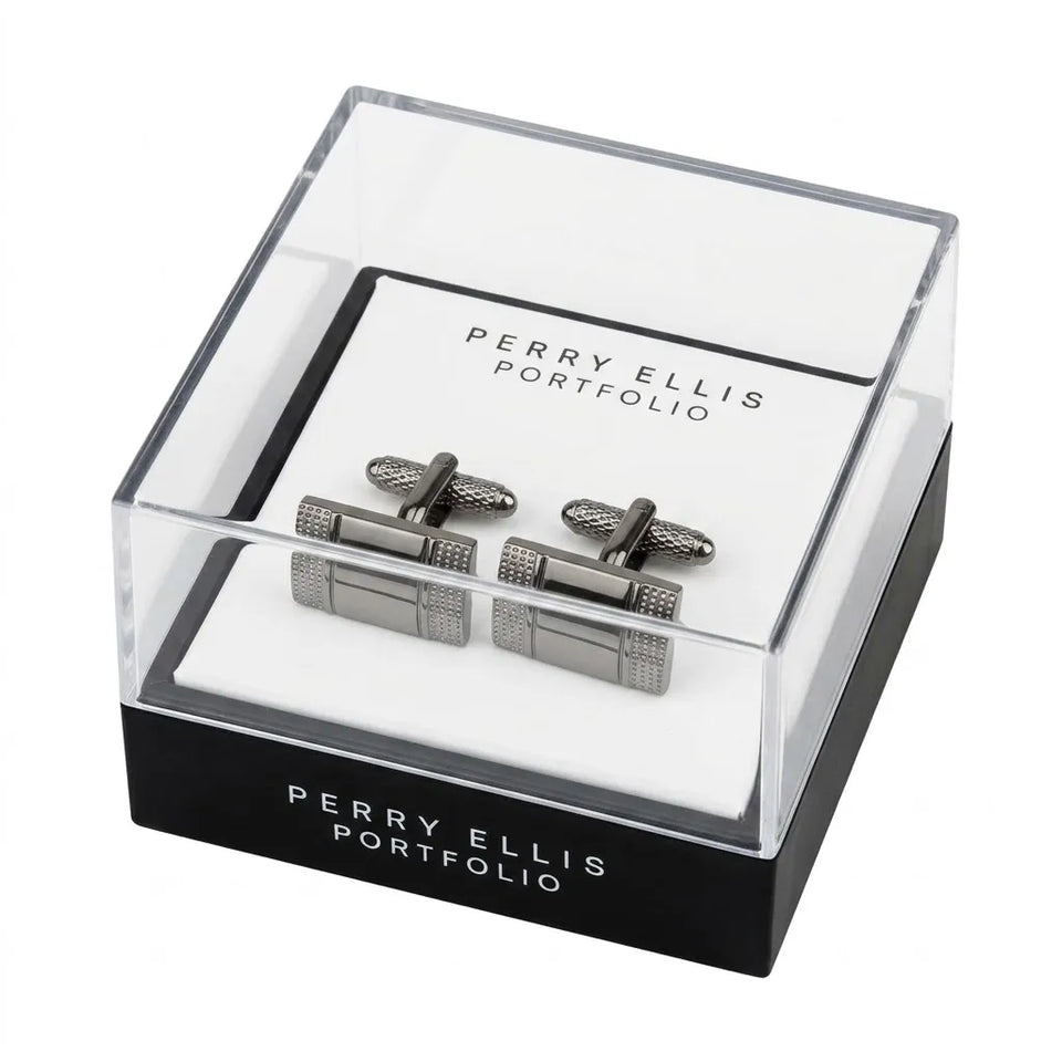 A pair of silver-toned cufflinks displayed inside a clear acrylic presentation box with a black base. The box is branded 'PERRY ELLIS PORTFOLIO' and set against a plain white background.