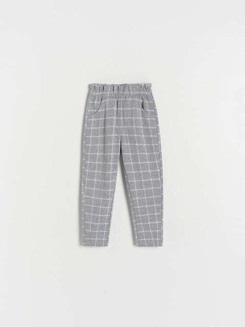 Gray checkered pants on a white background