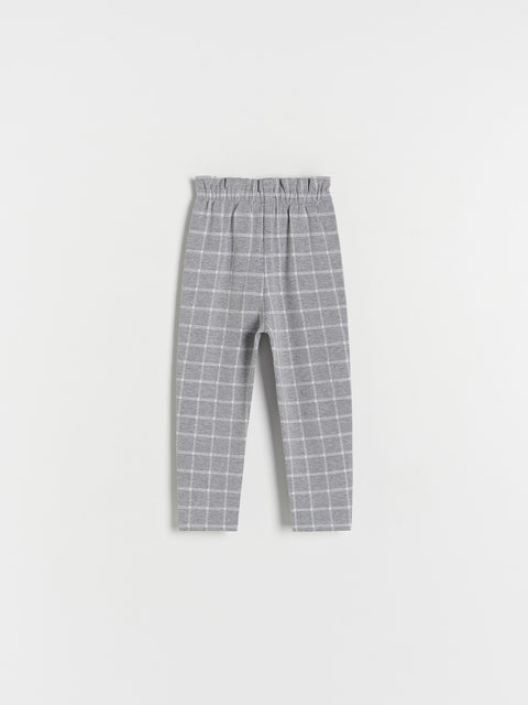 Checkered pants on a light gray background