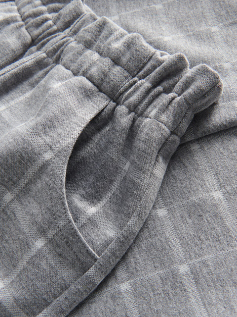 Gray plaid fabric with a close-up of the texture and pattern.