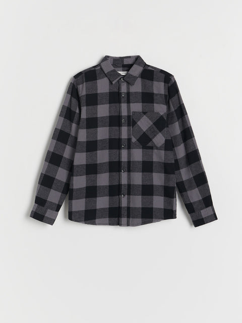 Gray and black checkered shirt on a white background