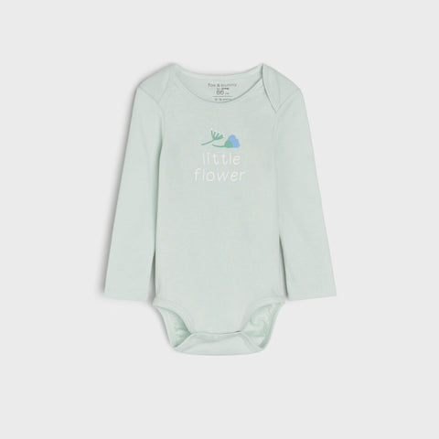 Light blue baby bodysuit with text on a white background