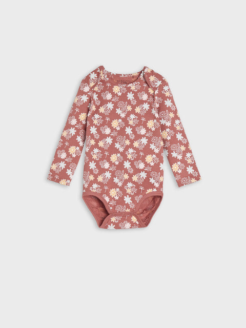 Floral-patterned baby bodysuit on a light gray background