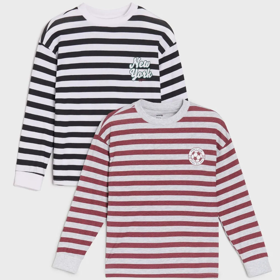 Two long-sleeve striped shirts shown on a light gray background. The back shirt is black and white striped with 'New York' text on the chest.