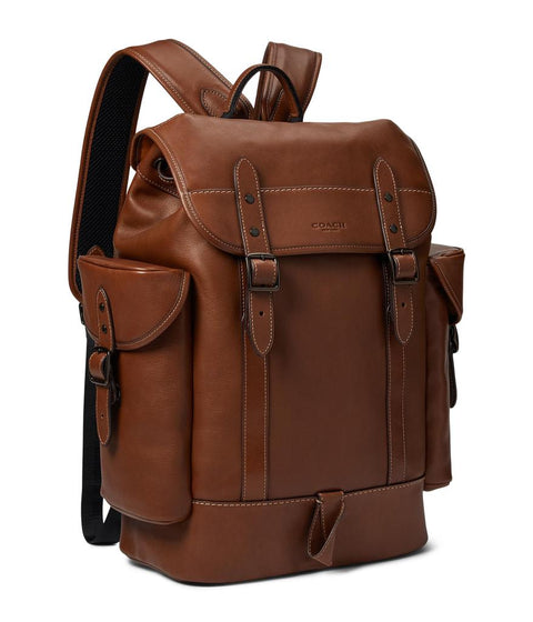 Brown leather backpack on a white background